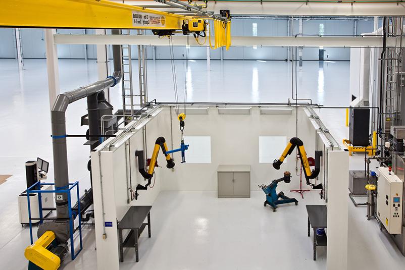 Interior robotics in the Rolls Royce Crosspointe Rotatives Facility.